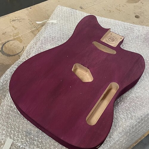 T-style body in a deep purple stain, ready for hardware